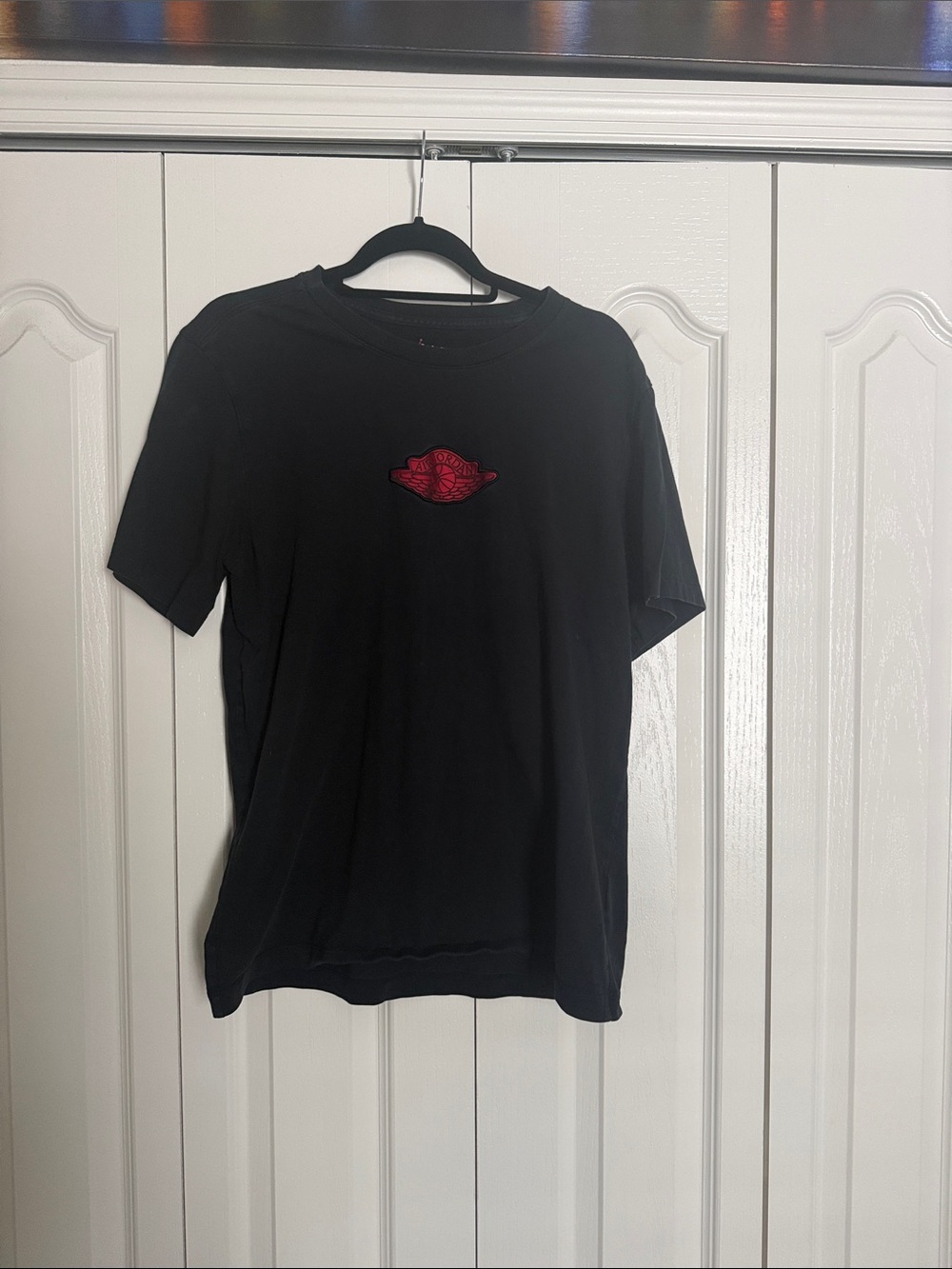 Jordan Black Short-Sleeve Tee with Red Logo Patch